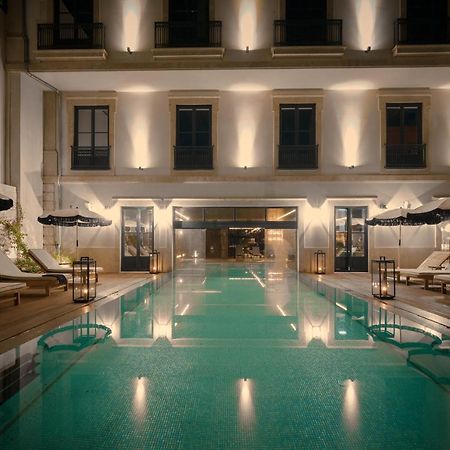 Ga Palace Hotel & Spa, A Xixth-Century Villa Porto Eksteriør billede The pool at the hotel
