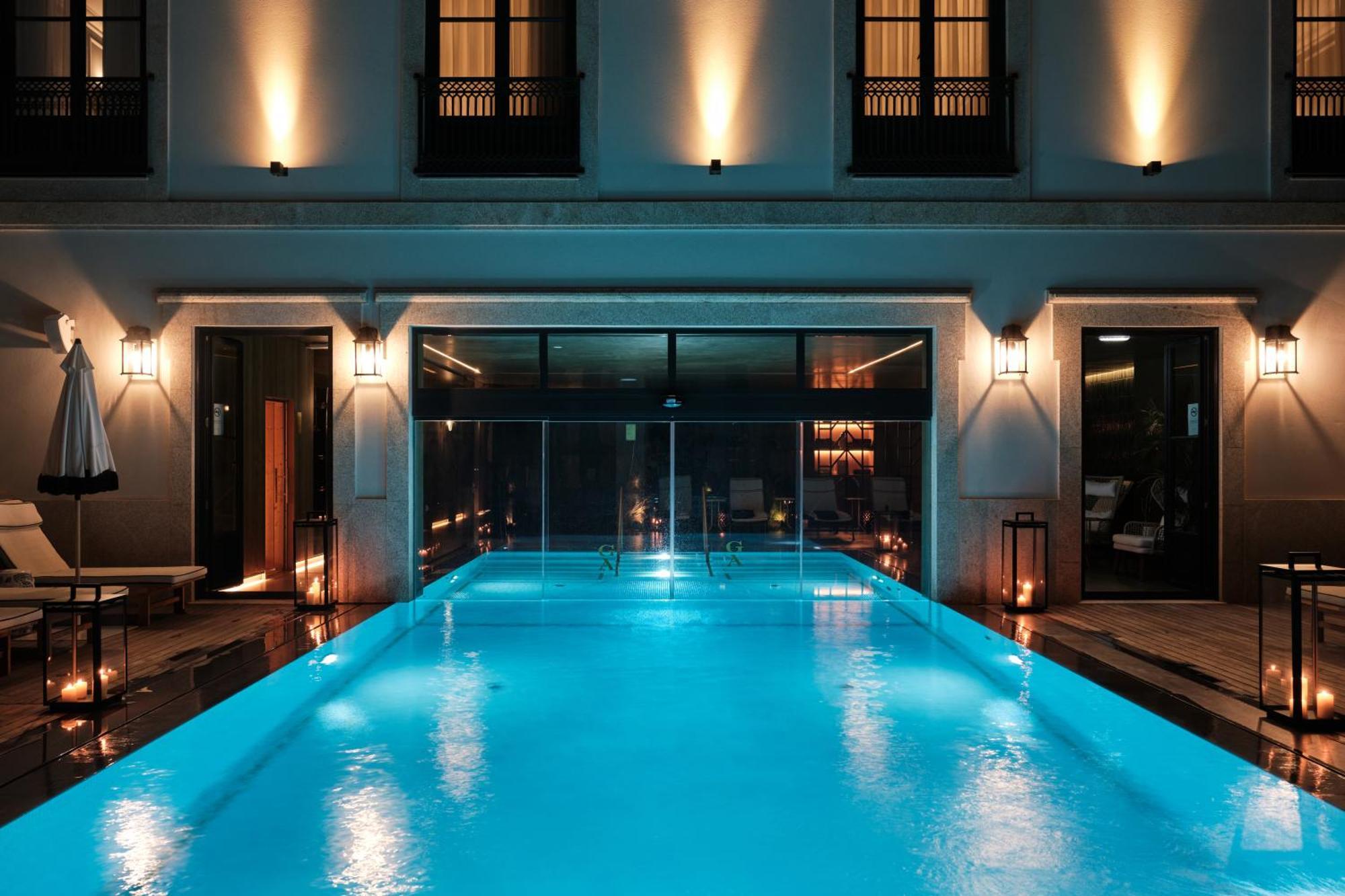 Ga Palace Hotel & Spa, A Xixth-Century Villa Porto Eksteriør billede The pool at the Hotel Indigo Athens